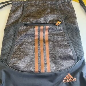 Adidas Gray and gold drawstring Backpack  like new !
